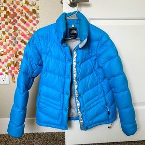 The North Face blue puffer coat